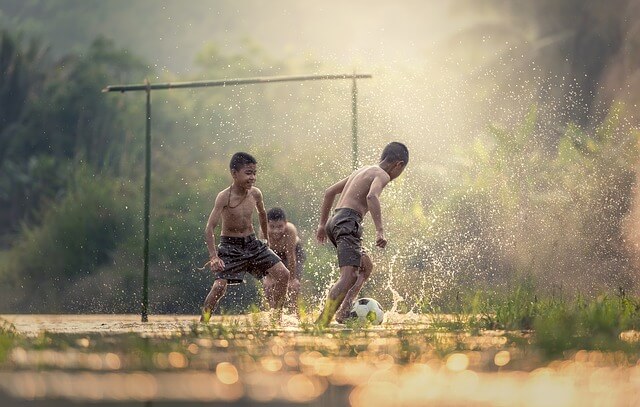 transmit electricity without a transmission line- kids playing football 