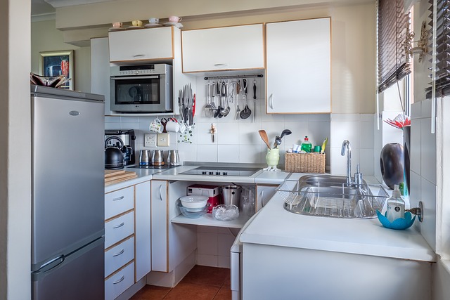 A kitchen with microwave oven 